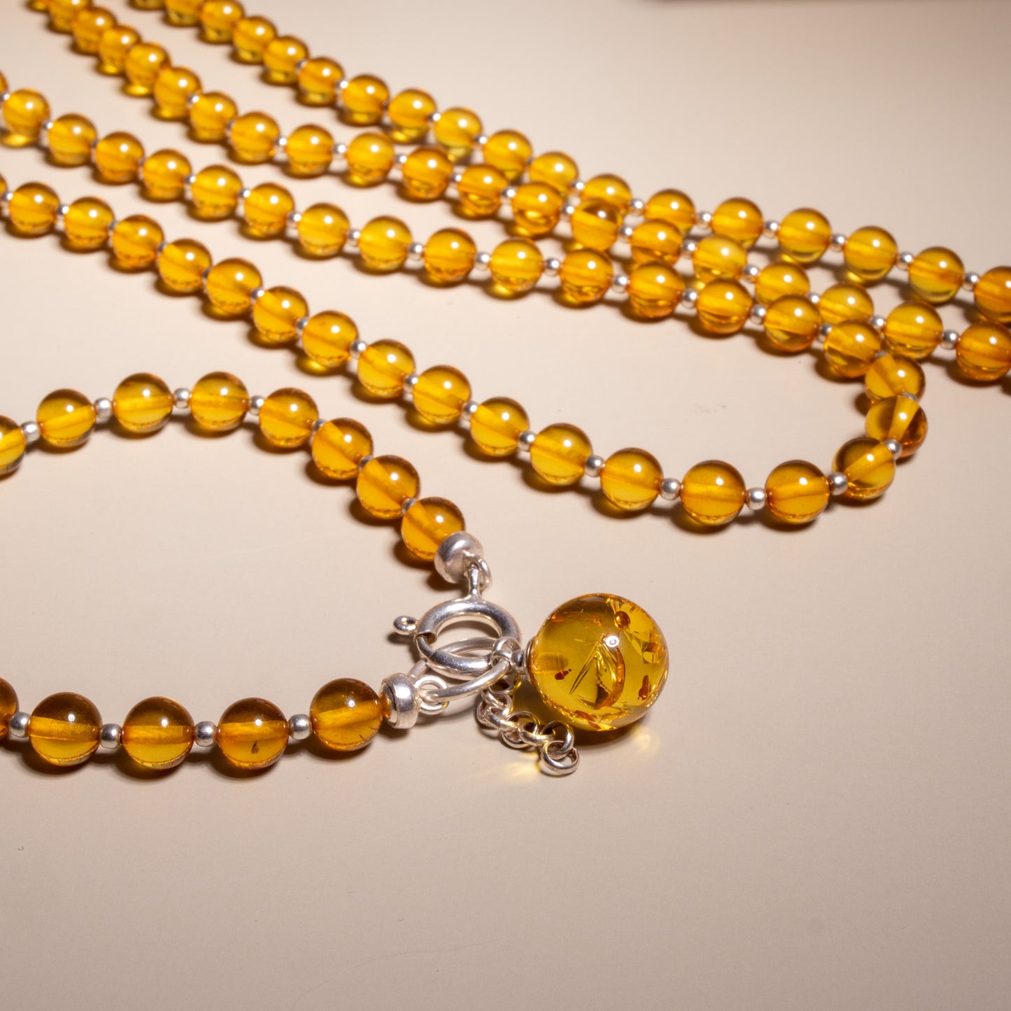 Conjunto de Âmbar Báltico Honey com Prata 925 – Colar 70 cm + Pulseira Ajustável