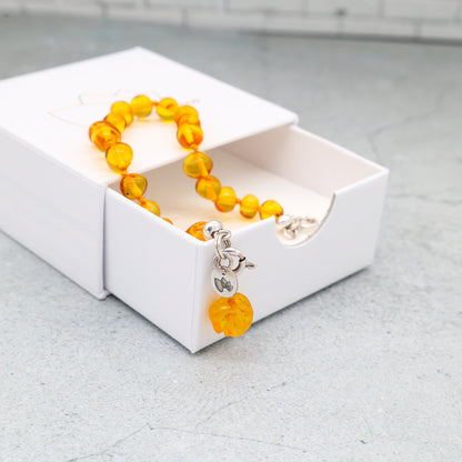 Pulseira de Âmbar Báltico Mel Claro 18 cm com pingente ROSA