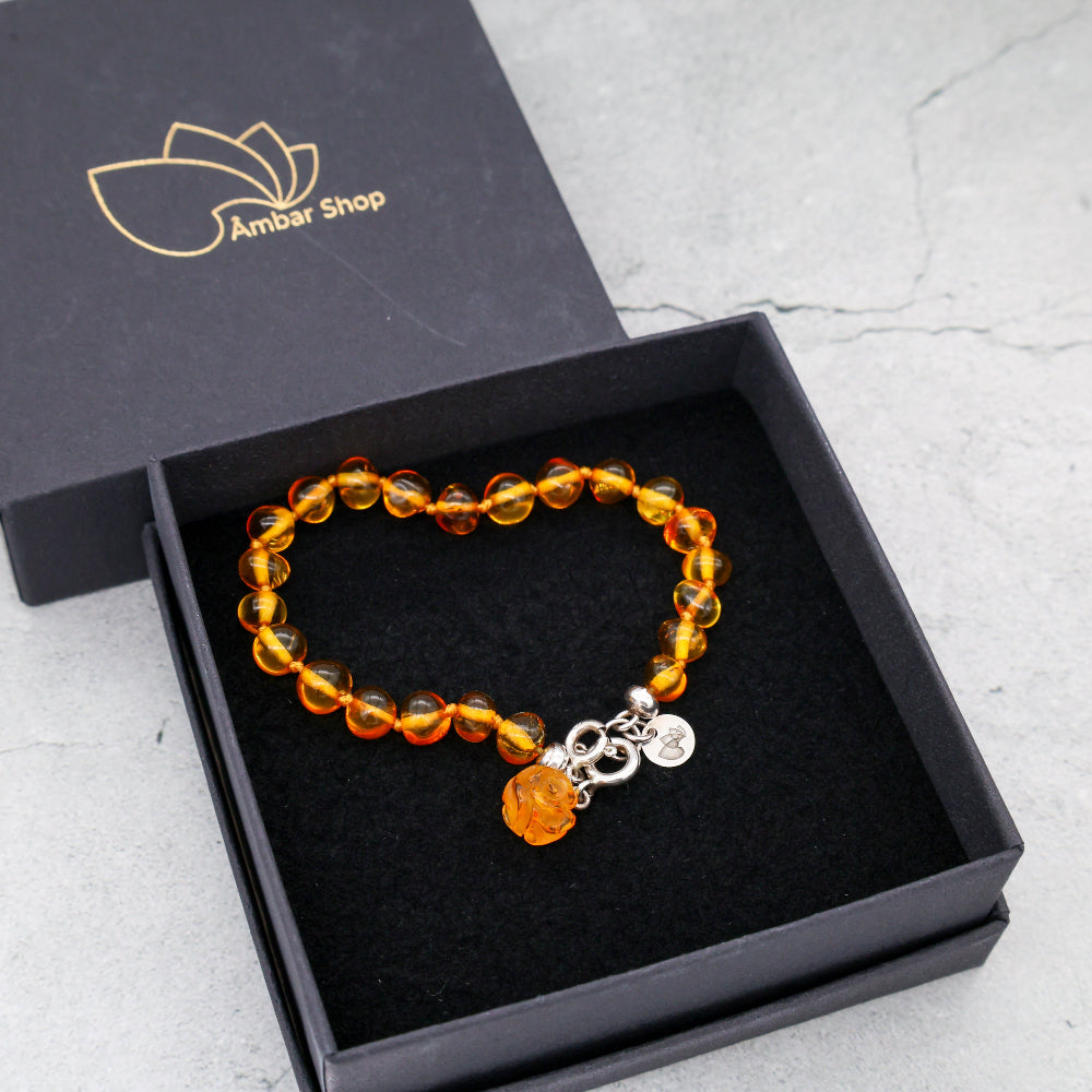 Pulseira de Âmbar Báltico Mel Claro 18 cm com pingente ROSA