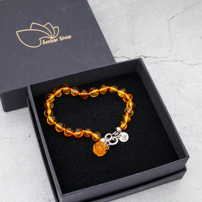 Pulseira de Âmbar Báltico Mel Claro 18 cm com pingente ROSA