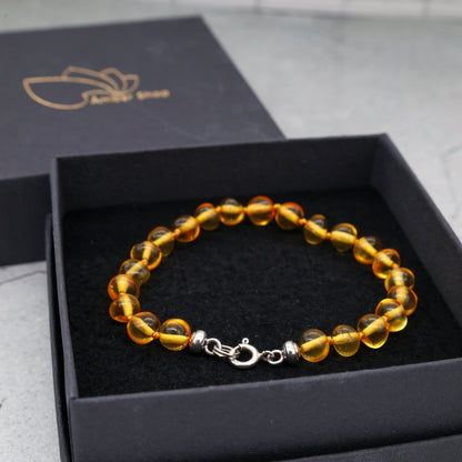 Pulseira de Âmbar Báltico Mel Claro 18 cm com fecho de prata